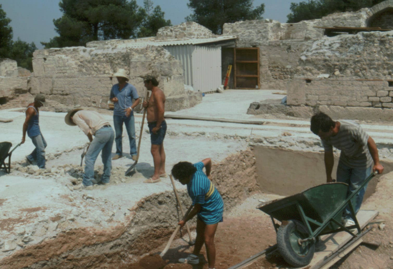 Excavators digging beneath floor of Roman Bath